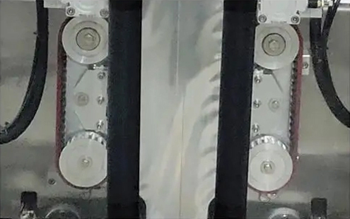 detail van de zakverpakkingsmachine - Gesynchroniseerd zaktrekwiel